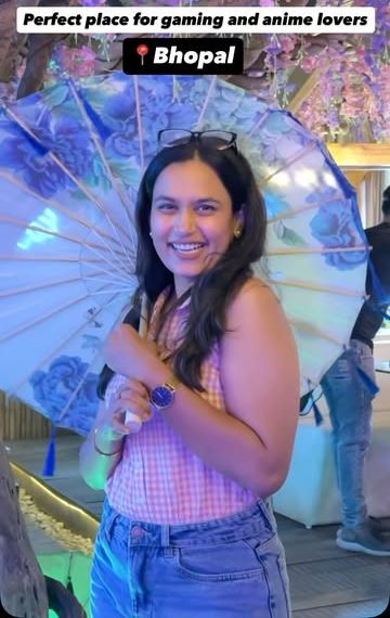 Guest posing with a Japanese paper umbrella